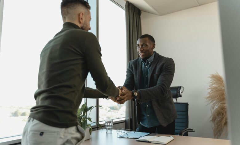 Two businessmen shaking hands during a professional meeting